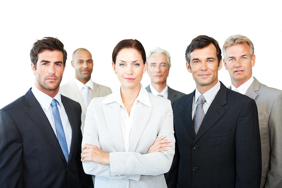 Confident business colleagues standing together Photograph by GlobalStock