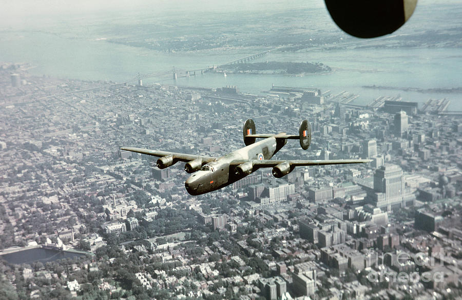 Consolidated B-24 Liberator over Montreal Photograph by Oleg Konin