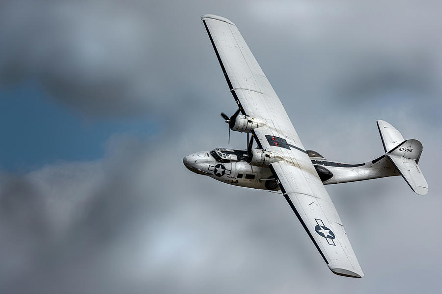 Consolidated PBY Catalina turning in flight Photograph by Scott Lyons