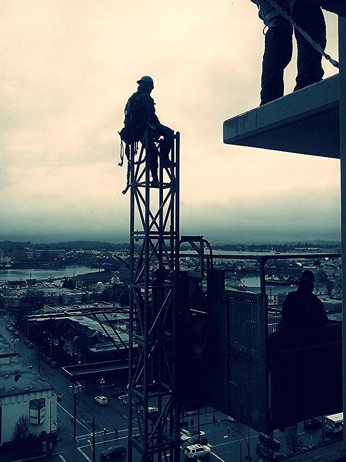 Construction Worker At Rest High Up In The Air Photograph by Silentfoto