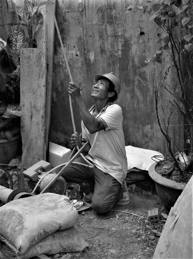 Construction worker with the rope Photograph by Robert Bociaga