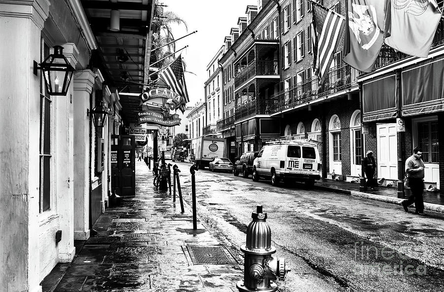 Conti Street Morning in New Orleans Photograph by John Rizzuto