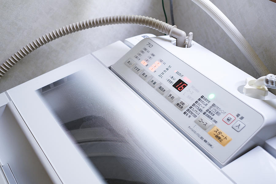 Control panel of washing machine in the laundry room Photograph by Wako Megumi