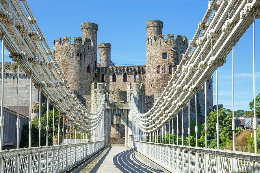 Conwy suspension bridge and Conwy Castle, Gwynedd, North Wales Photograph by Neale And Judith Clark