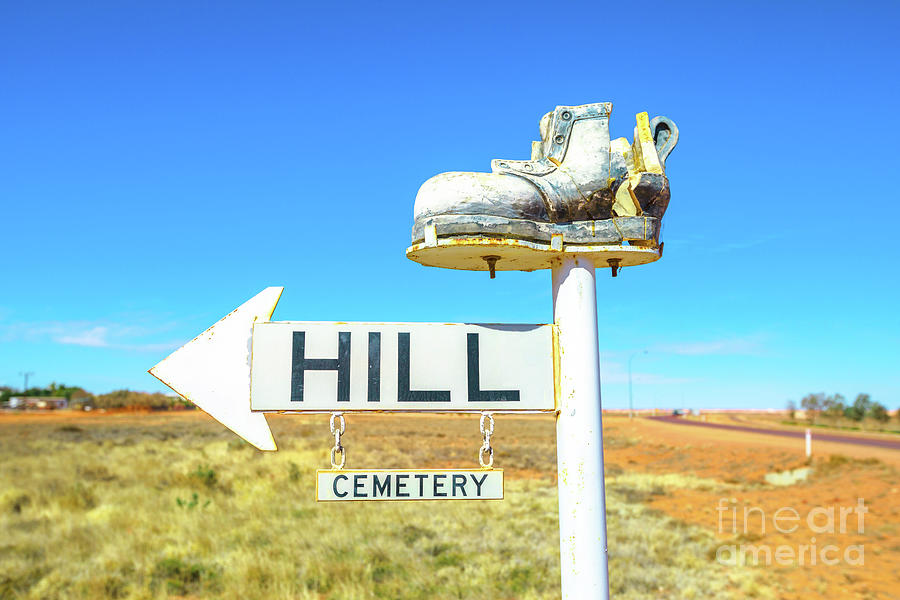 Coober Pedy cemetery hill road sign Photograph by Benny Marty
