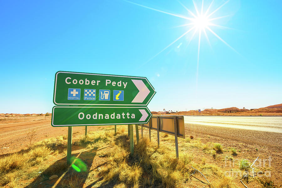 Coober Pedy directions road sign Photograph by Benny Marty