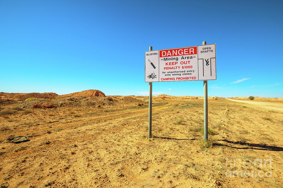 Coober Pedy mining area road sign Photograph by Benny Marty