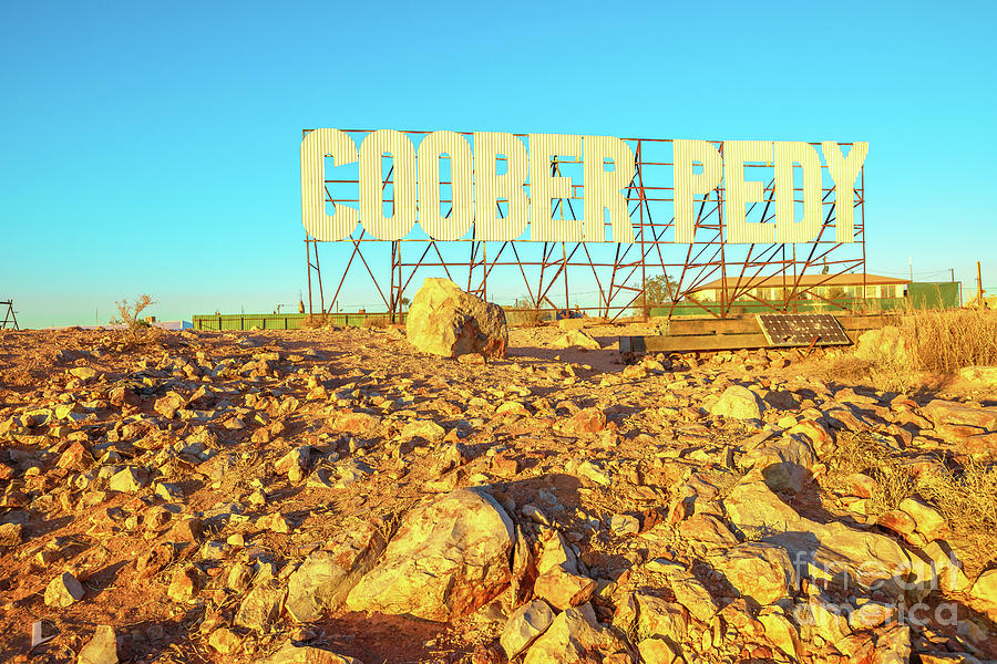 Coober Pedy wellcome sign at sunset Photograph by Benny Marty