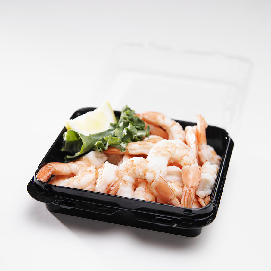 Cooked shrimps in container, close-up Photograph by Foodcollection RF