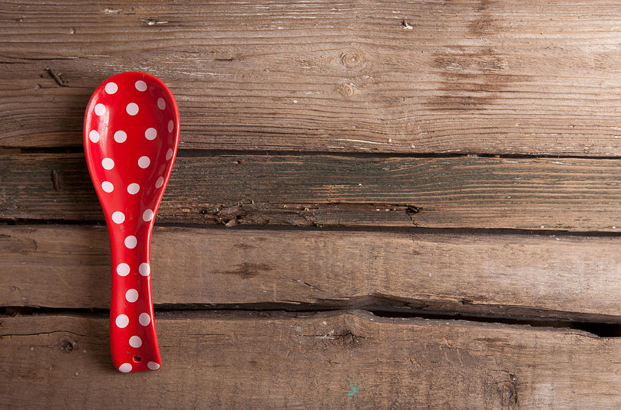 Cooking Red Spoon With Polka Dots On Wooden Background Photograph by Ellemarien