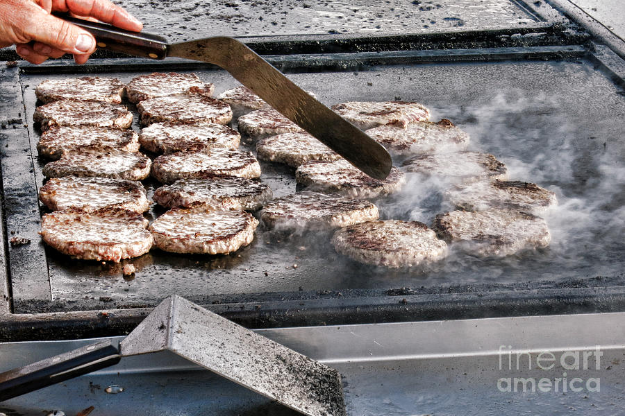 Cooking the Burgers Photograph by Olivier Le Queinec