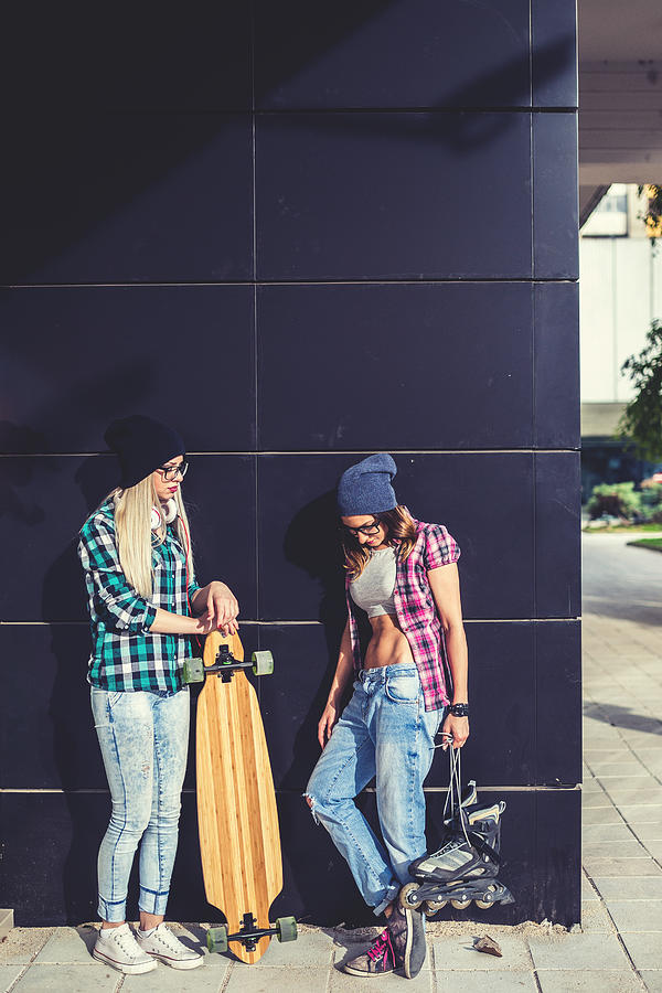 Cool teen skater friends Photograph by Miodrag Ignjatovic