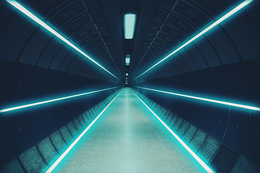 Cool underground tunnel with nice vanishing point and neon lights. Photograph by Artur Debat