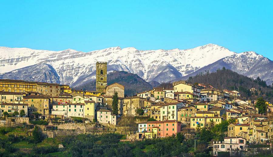 Coreglia Antelminelli and Snowy Apennines Photograph by Stefano Orazzini