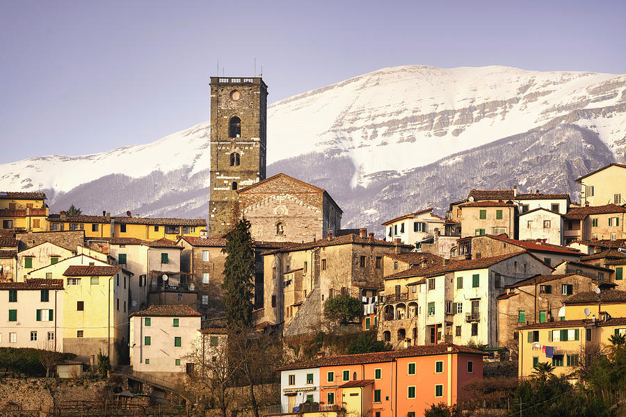 Coreglia Antelminelli old town and snowy mountains Photograph by Stefano Orazzini