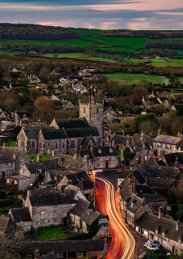 Corfe Castle In England Seen Just Before Sunrise. Photograph