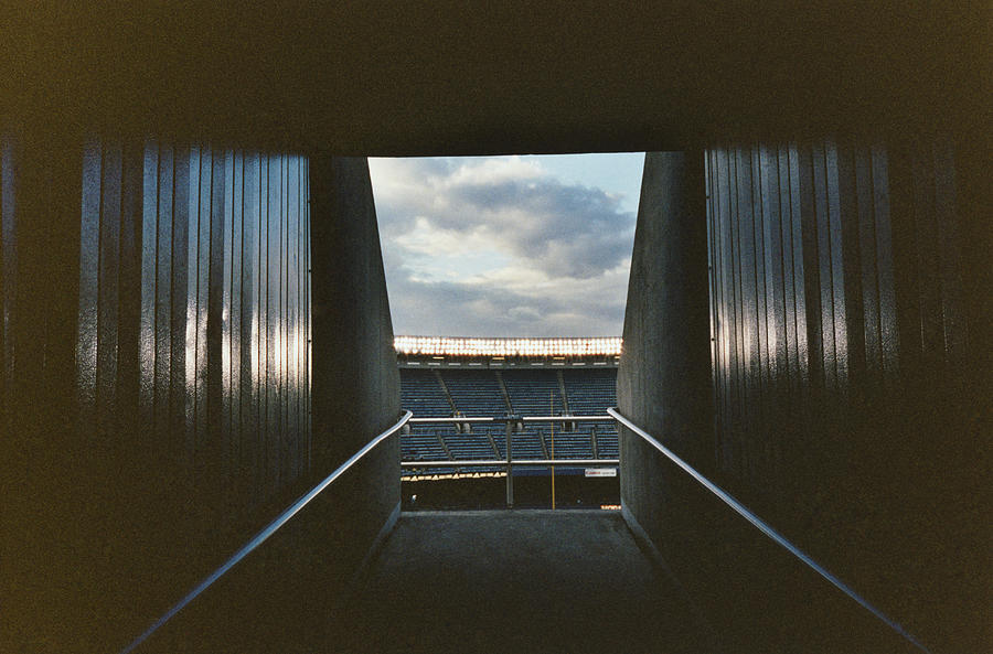 Corridor in stadium Photograph by Charles Gullung
