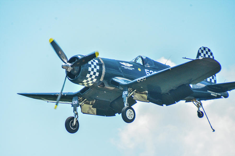 Corsair and landing gear Photograph by Ed Stokes