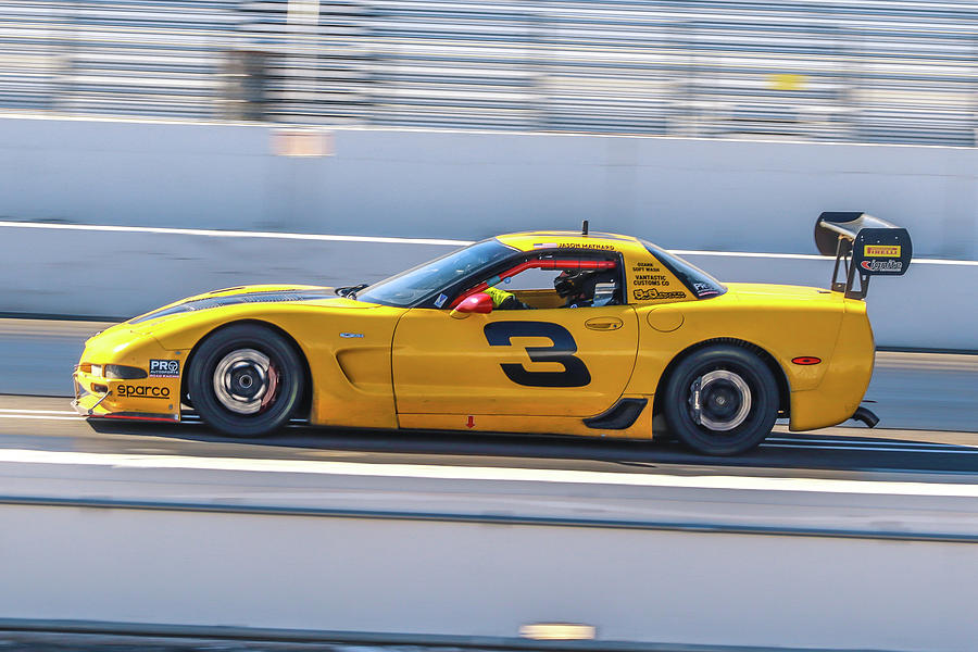 Corvette Z06 at speed Photograph by Darrell Foster