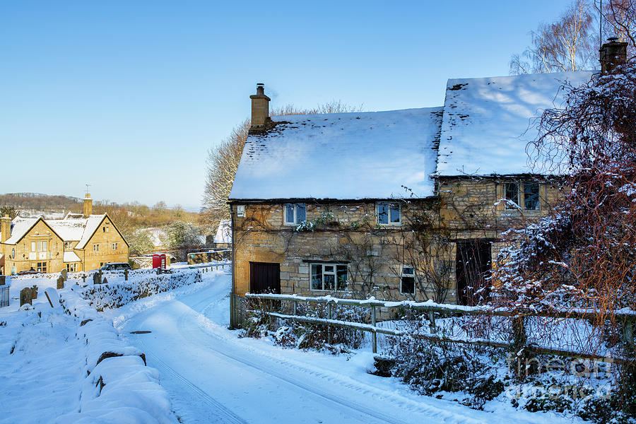 Cotswold Stone Cottages in Snowshill in the January Snow Photograph by Tim Gainey