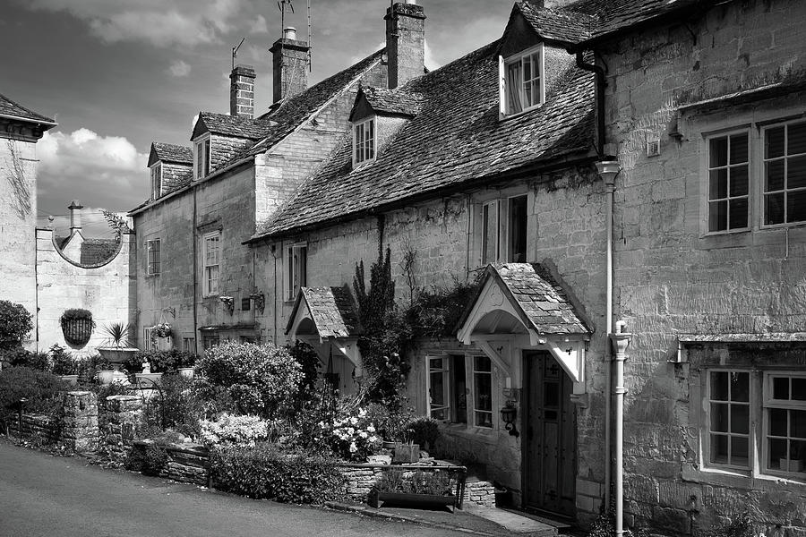 Cotswold stone houses line the streets in Painswick Photograph by Seeables Visual Arts