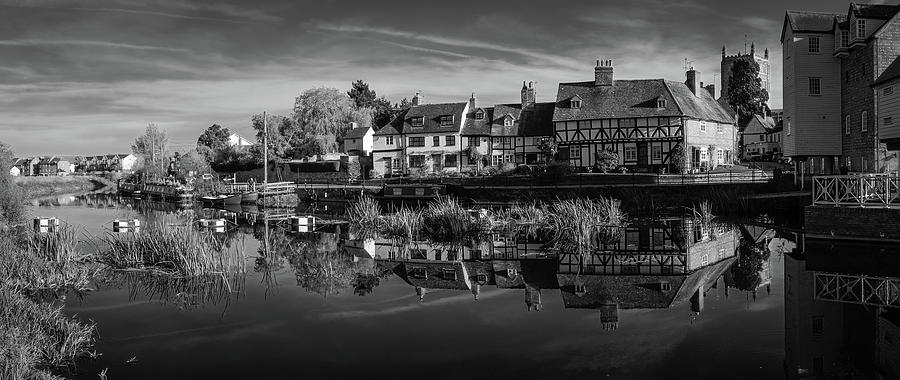 Cottages reflected in the tranquil River Avon Photograph by Seeables Visual Arts