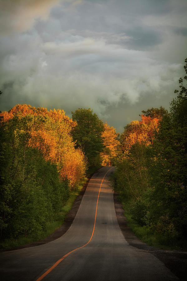 Country Road and Breaking Storm Light Photograph by Irwin Barrett