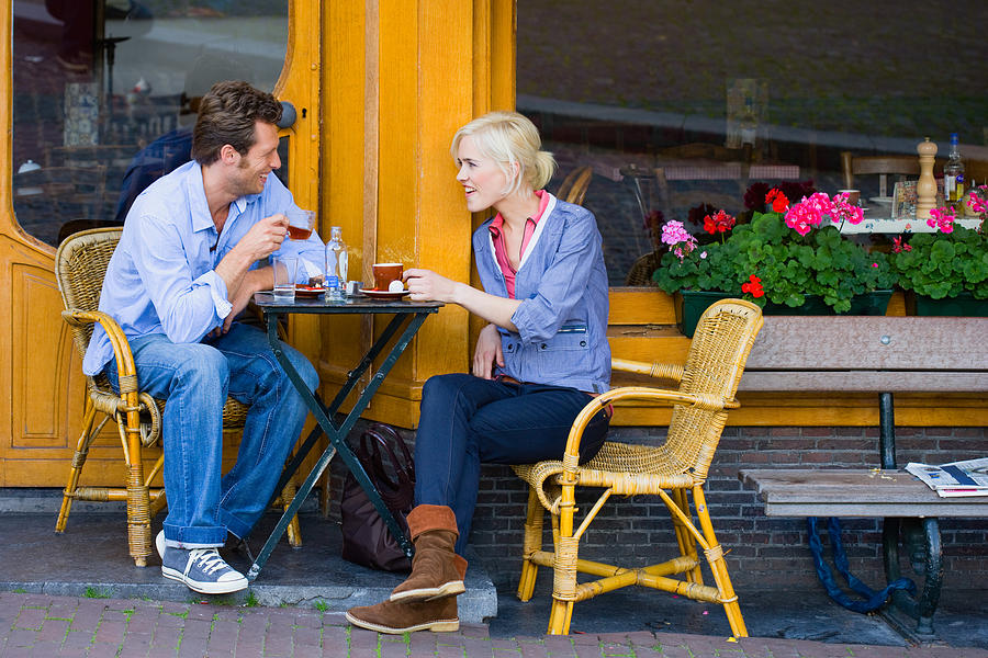 Couple at cafe Photograph by Image Source