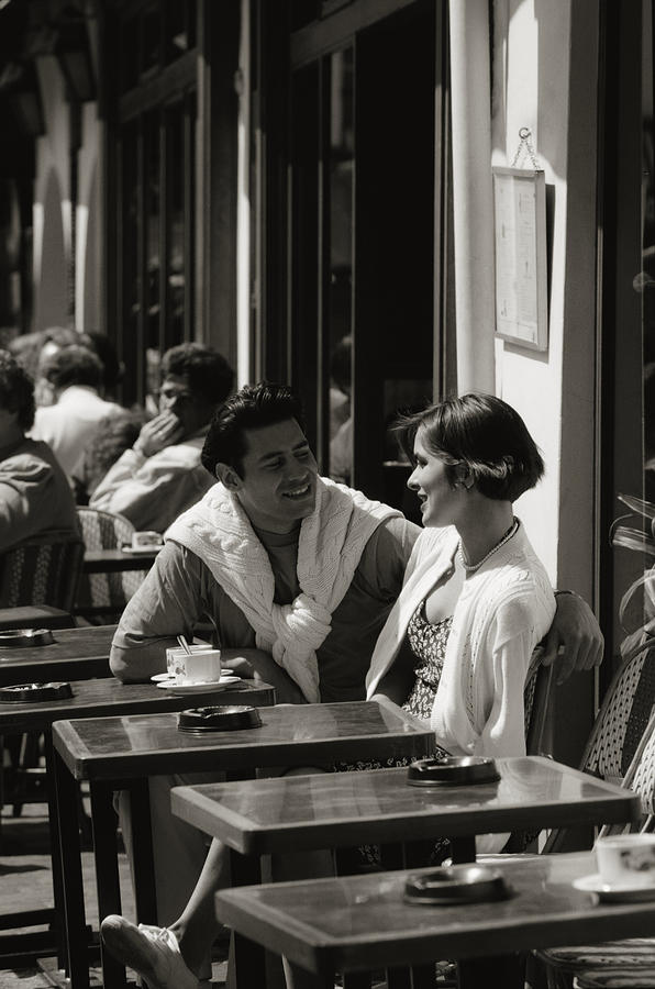 Couple At Outdoor Cafe In Paris Photograph by Butch Martin