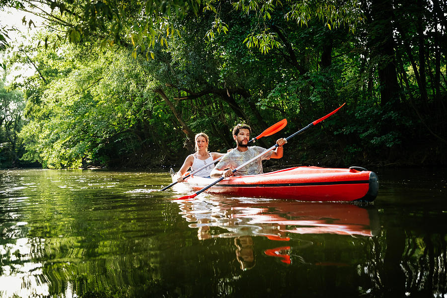 Couple Exploring Canals In Large Kayak Together Photograph by Tom Werner