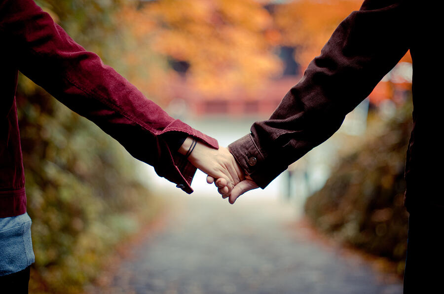 Couple holding hands Photograph by Juan Paulo Gutierrez