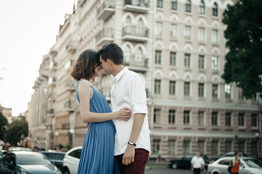 Couple kissing on the street Photograph by Igor Ustynskyy