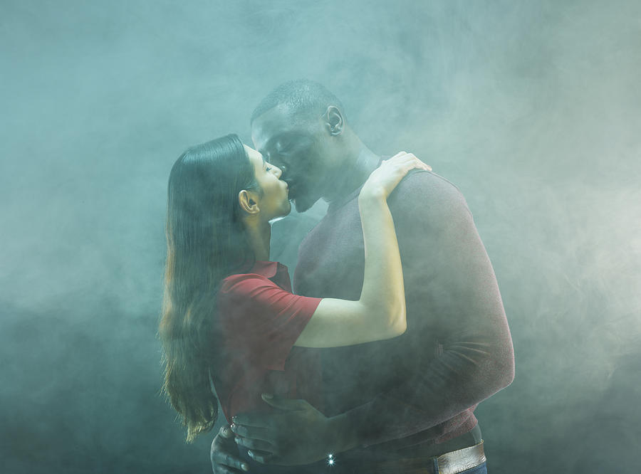 Couple kissing surrounded by fog Photograph by Tim Macpherson