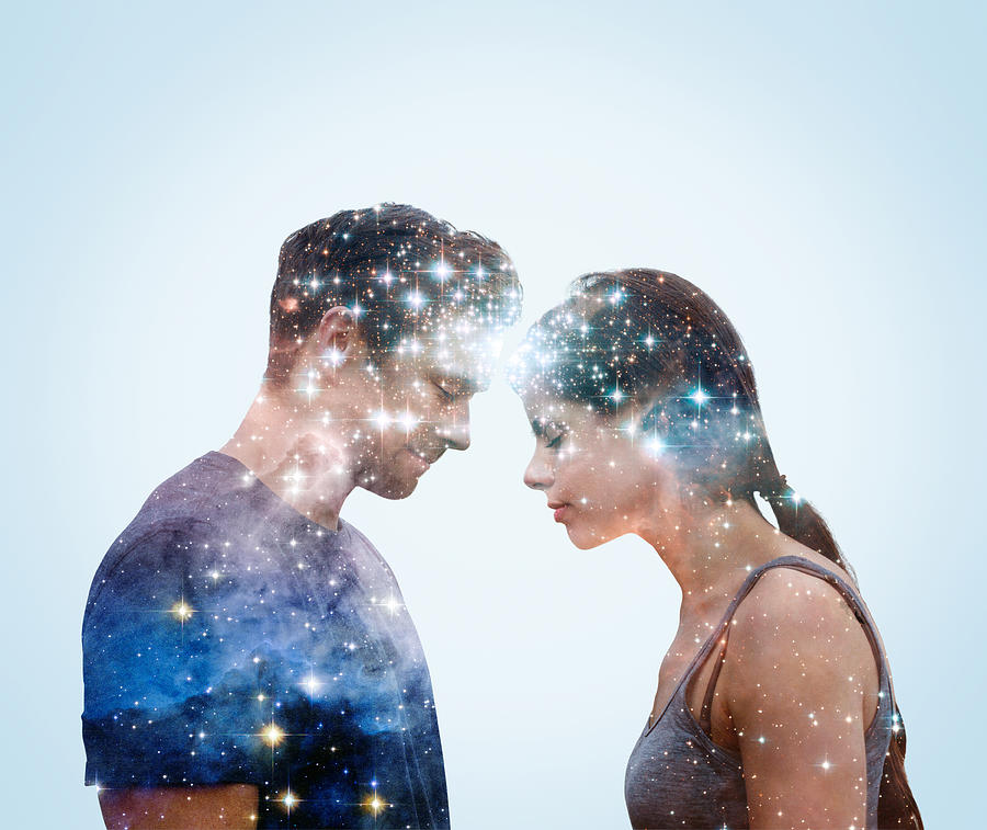 Couple leaning into each other with stars. Photograph by Tim Robberts