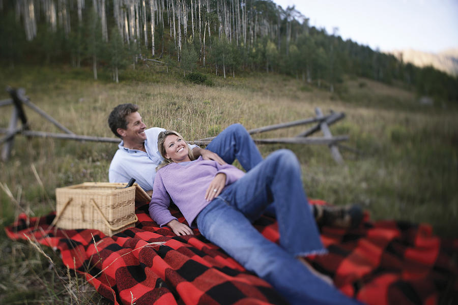 Couple on picnic Photograph by Comstock Images