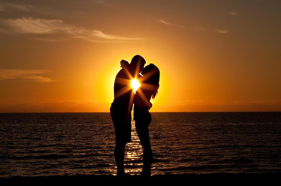 Couple on the Beach at Sunset Photograph by ImagineGolf