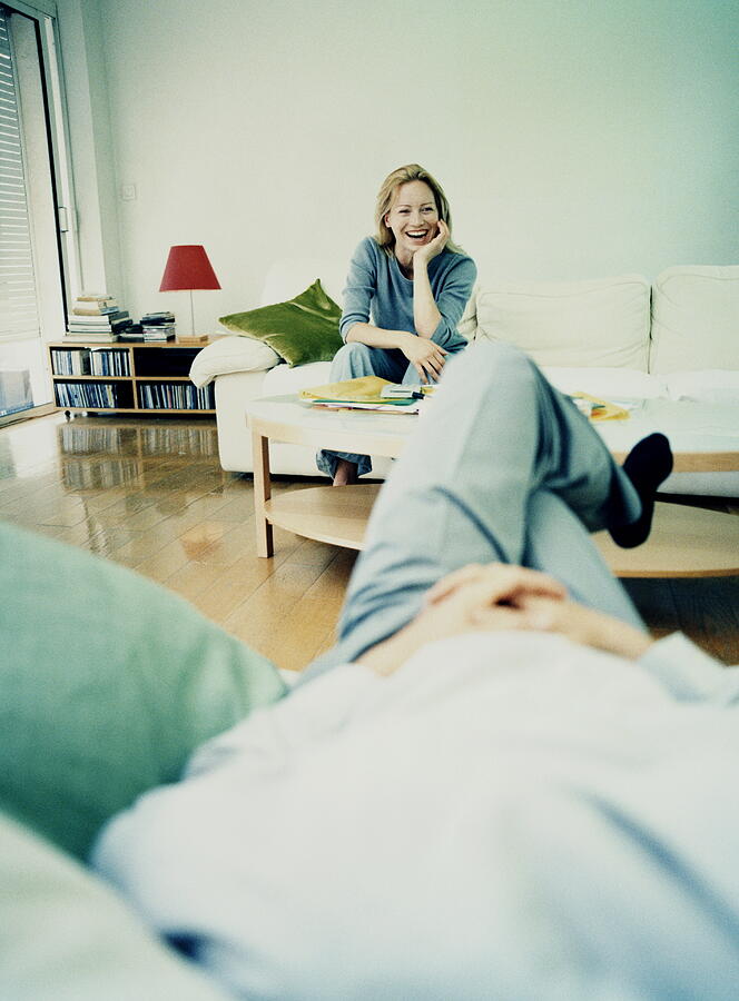 Couple Relaxing At Home Photograph by Britt Erlanson