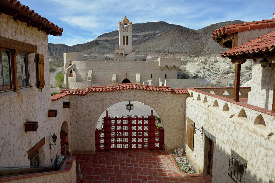 Courtyard at Scottys Castle looking towards the clock tower,  Death Valley, California Photograph by Kevin Oke