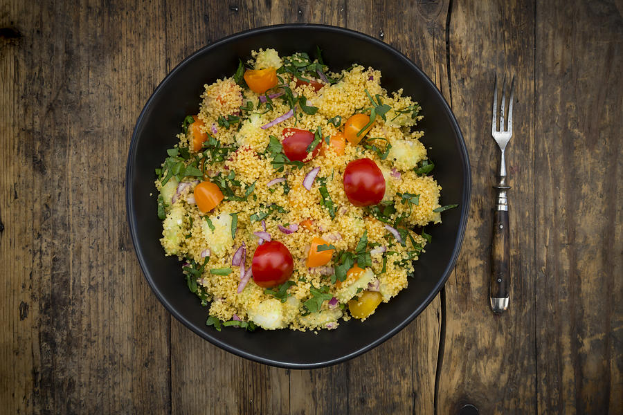 Couscous Salad with tomato, parsley, cucumber ans red onions Photograph by Larissa Veronesi