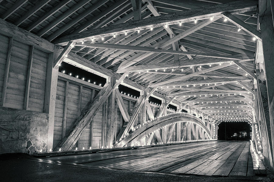 Covered Bridge Interior Lights - Black And White Photograph by Jason Fink