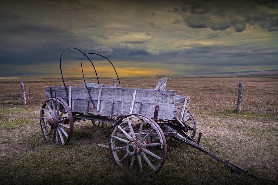 Covered Wagon at Sunset Deserted on the Prairie Photograph by Randall Nyhof