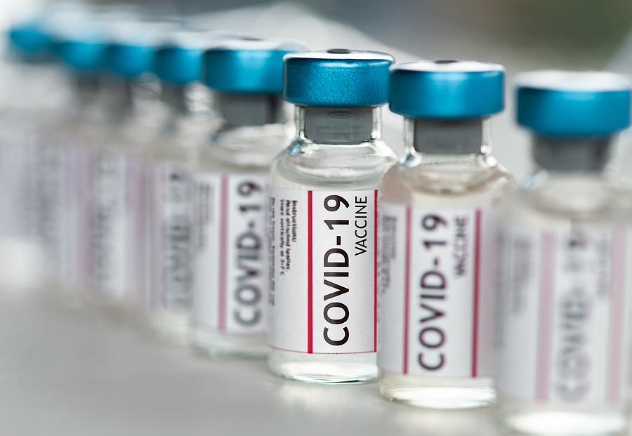 Covid-19 Coronavirus Vaccine vials in a row macro close up Photograph by MarsBars