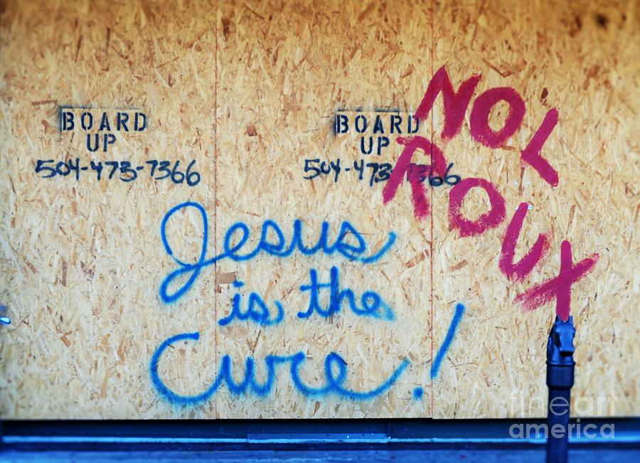 Covid 19 Graffiti Speaks Louder Than Words Jesus Is The Cure In The French Quarter Of New Orleans Photograph by Michael Hoard