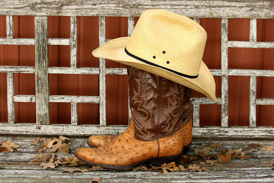 Cowboy Boots and Hat on Bench Photograph by Sheila Brown