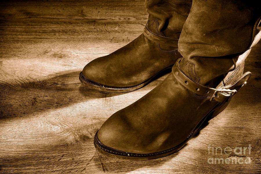 Cowboy Boots on Saloon Floor - Sepia Photograph by Olivier Le Queinec