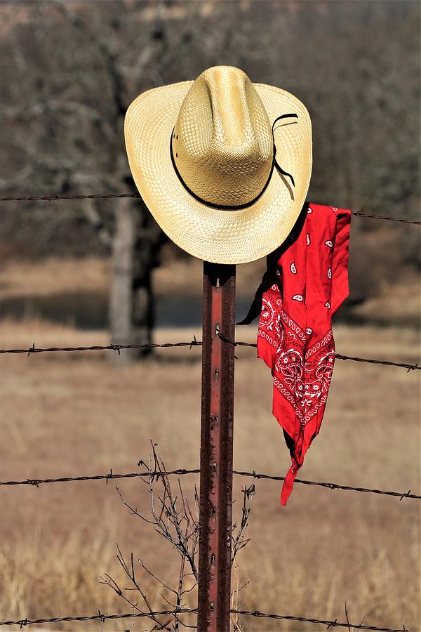 Cowboy Hat and Bandana on Fence Post Photograph by Sheila Brown