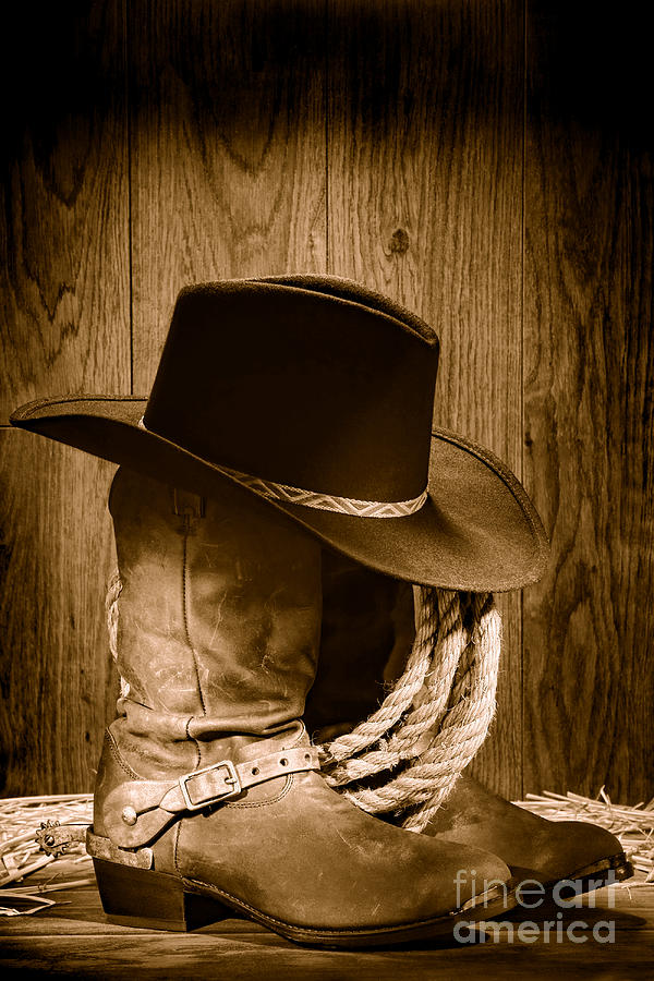 Cowboy Hat on Boots - Sepia Photograph by Olivier Le Queinec