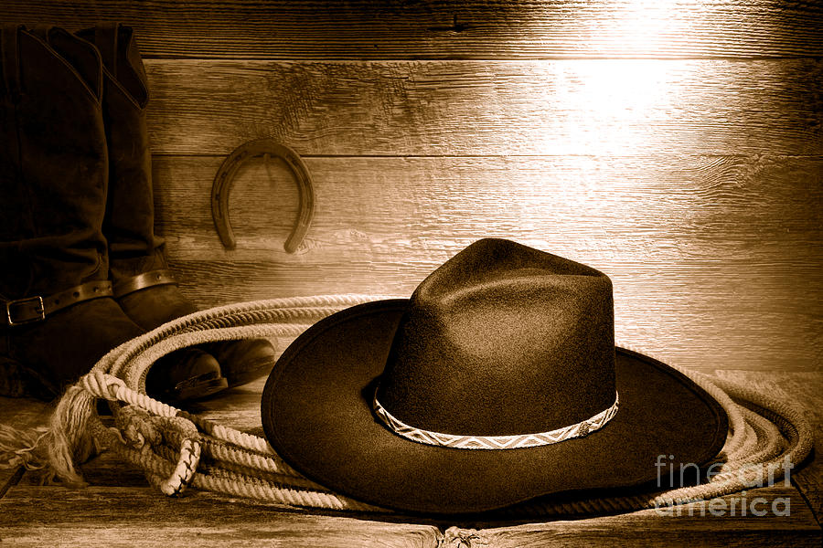Cowboy hat on Lasso - Sepia Photograph by Olivier Le Queinec