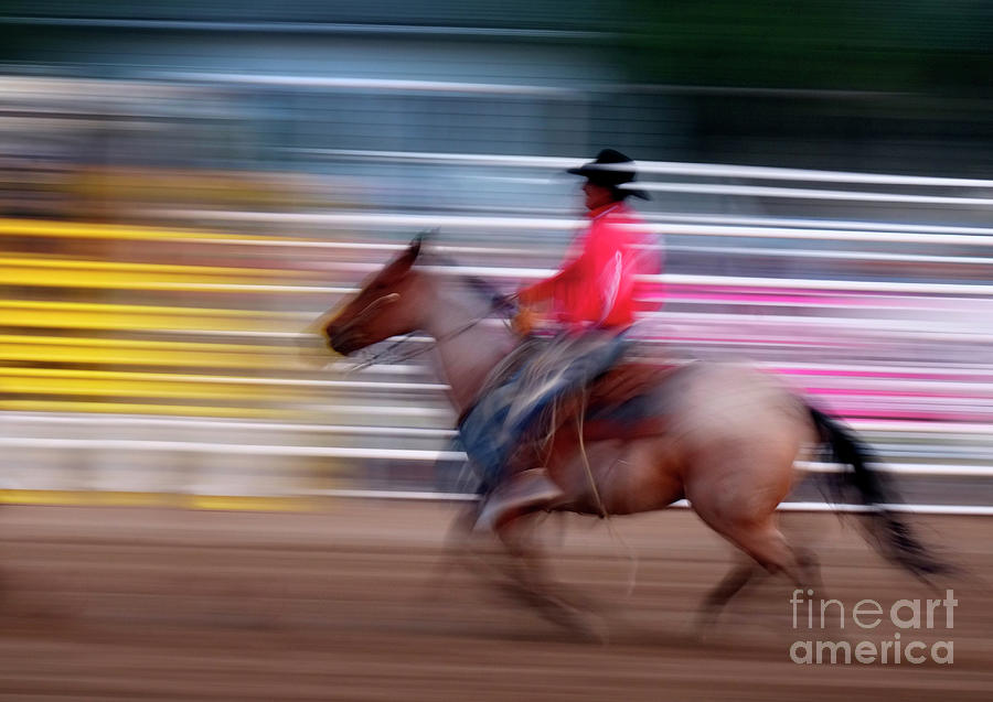 Cowboy Riding Horse Fast blurry Speed Photograph by Lane Erickson