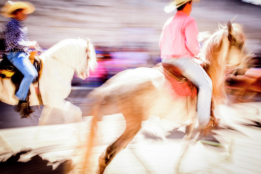 Cowboys In Motion Photograph